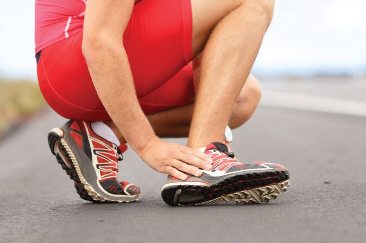 runner with swollen ankle