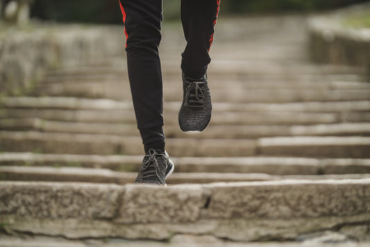 experienced runner running down steps