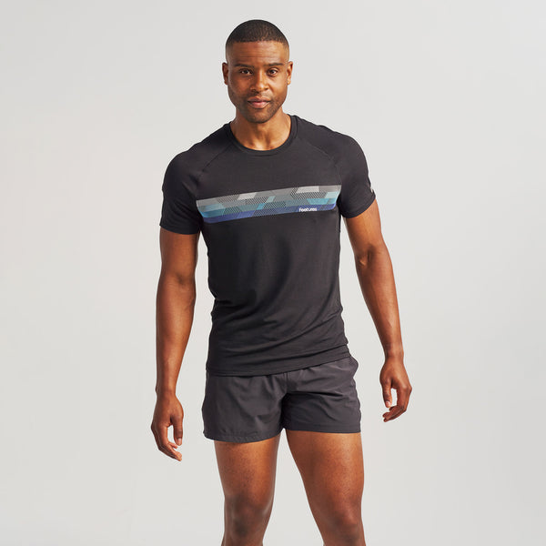 Black Feetures Graphic | model: Jalen - Wearing Size Medium - Waist 32 Inseam 33 Chest 40