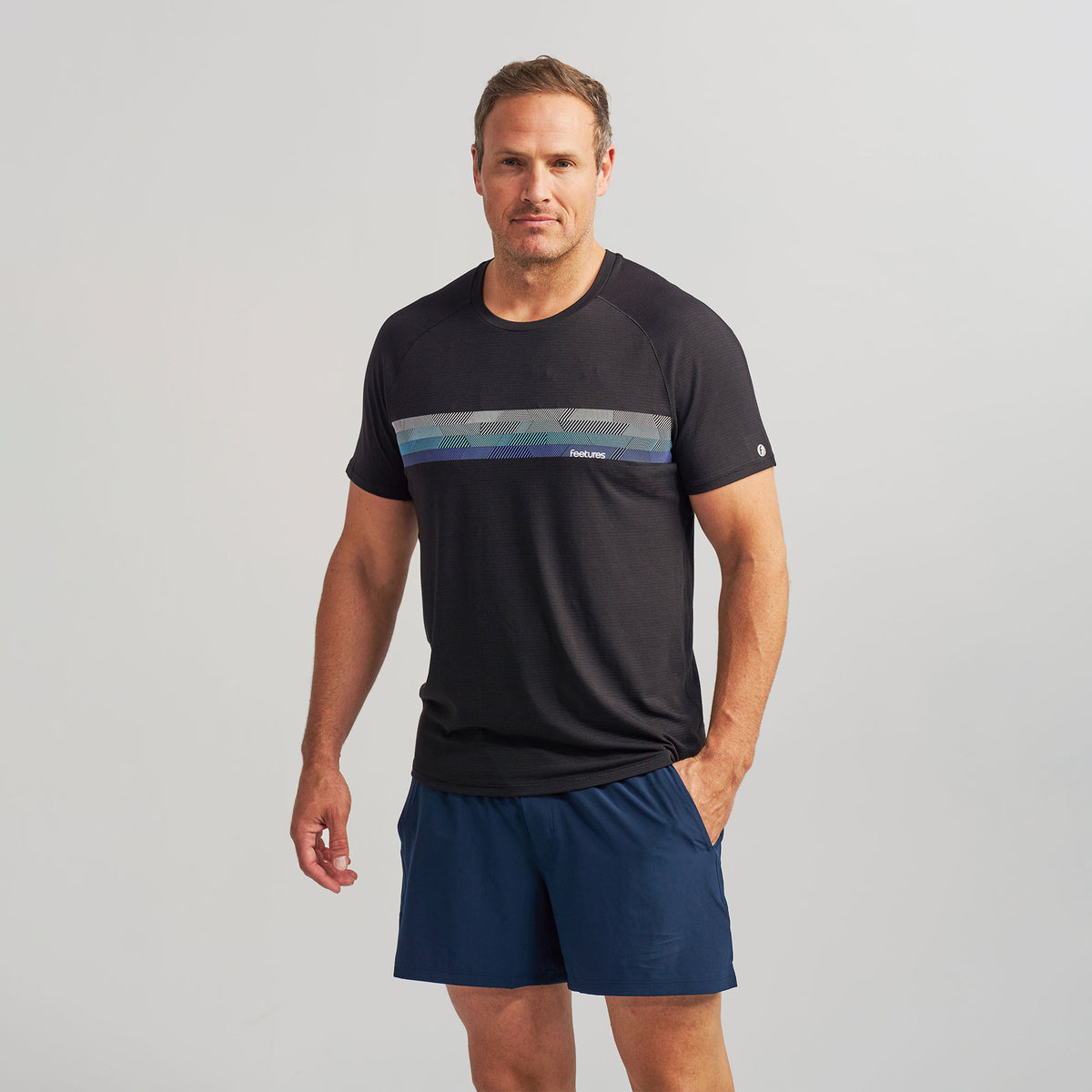 Men’s Stride Flex Performance Tee - Black Feetures Graphic | model: Sean - Wearing Size XL - Waist 36 Inseam 34 Chest 44