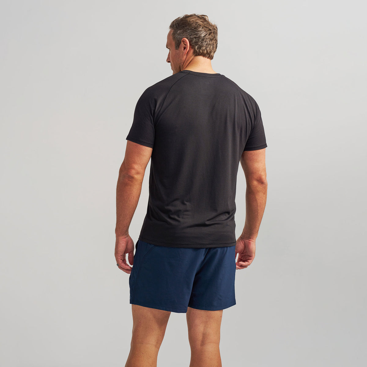 Men’s Stride Flex Performance Tee - Black Feetures Graphic