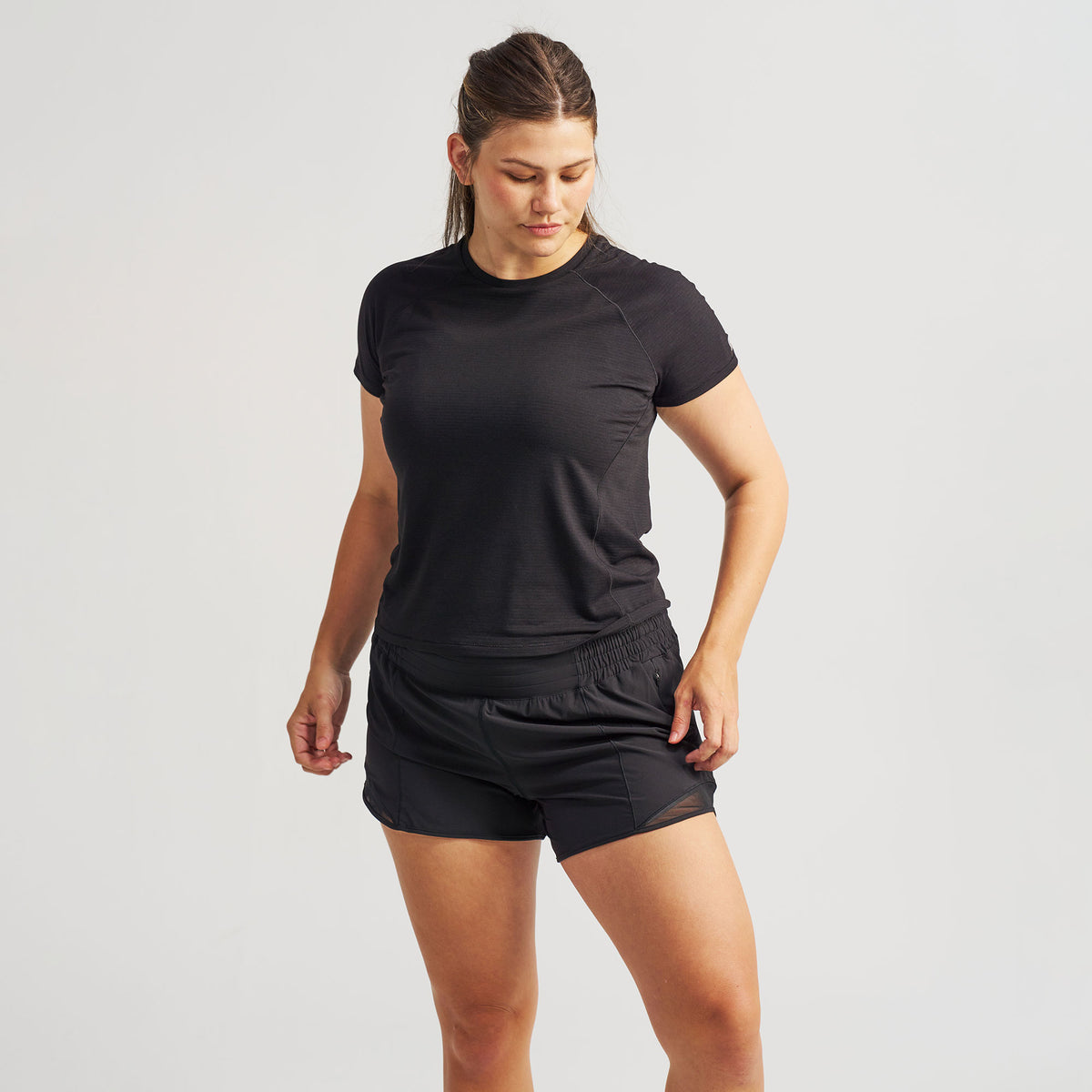 Women’s Stride Flex Performance Tee - Black | model: Lorna - Wearing Size Large - Typically a 12/14