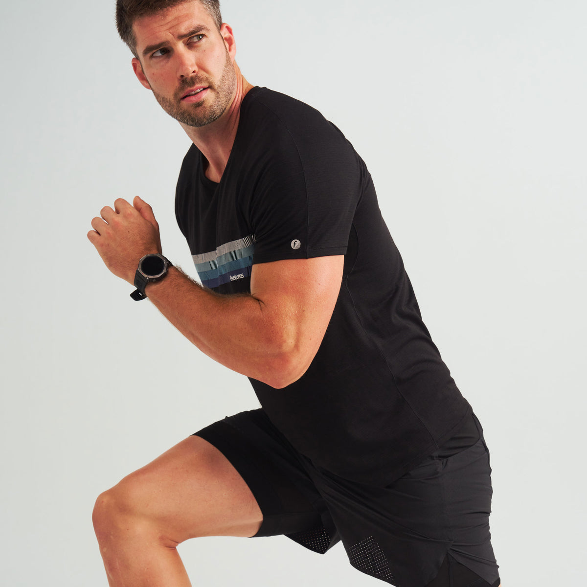 Men’s Stride Flex Performance Tee - Black Feetures Graphic