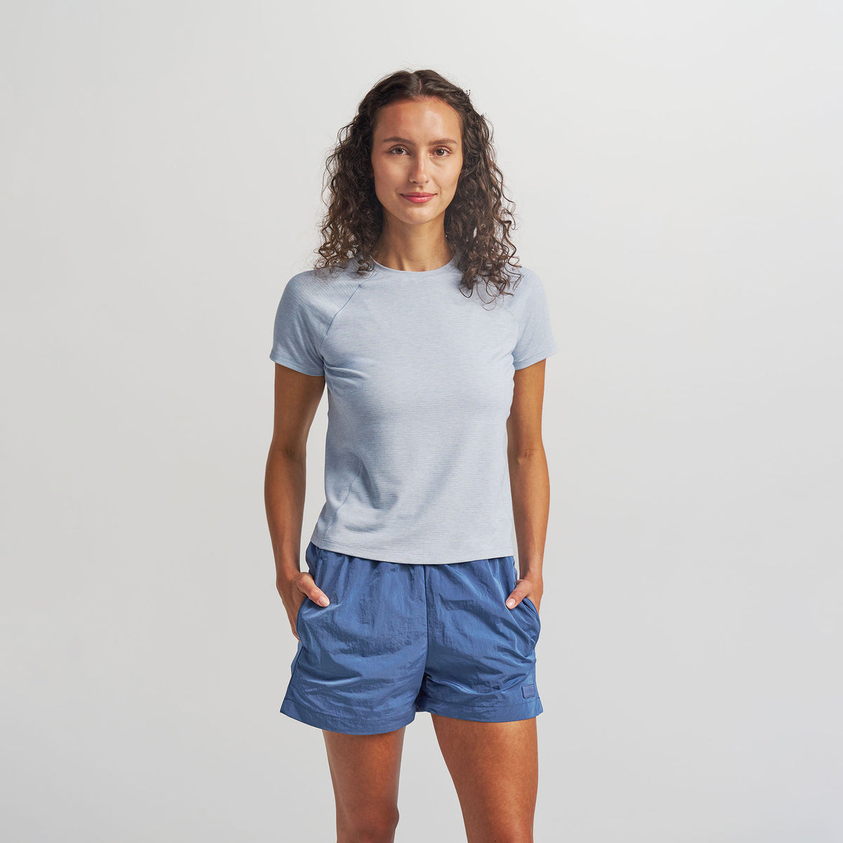 Women’s Stride Flex Performance Tee - Blizzard | model: Elena - Wearing Size Small - Typically a 2/4