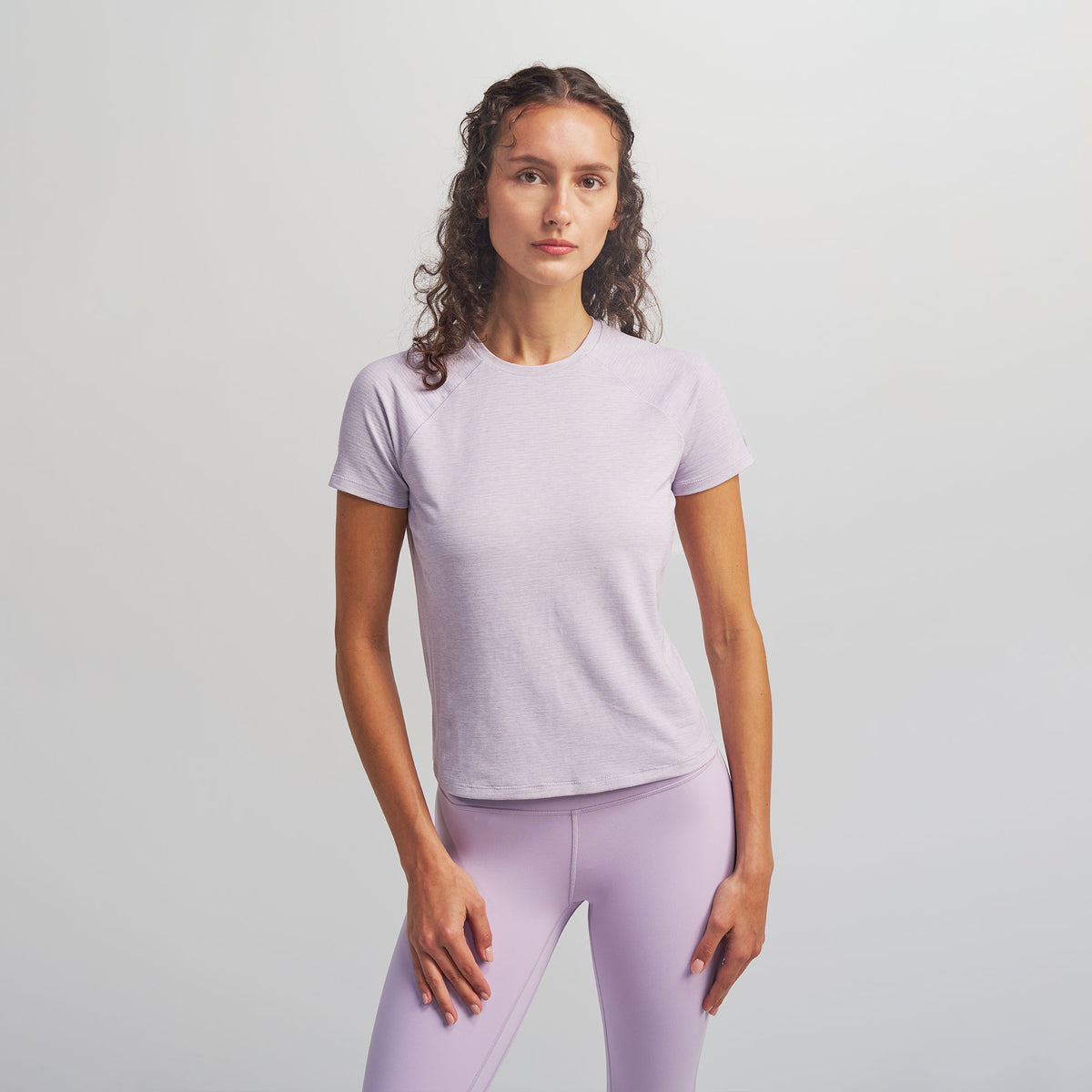 Women’s Stride Flex Performance Tee - Thistle | model: Elena - Wearing Size Small - Typically a 2/4